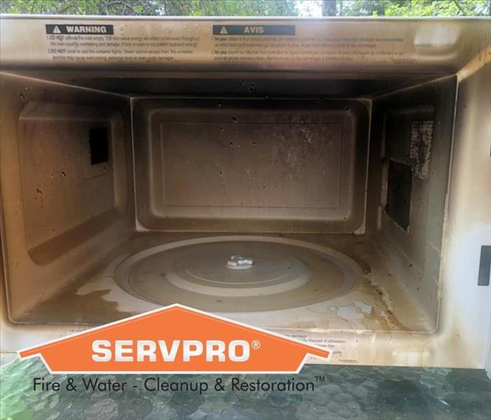 Inside of a microwave that caught on fire in a home in West Kelowna, BC. The microwave caught fire due to user