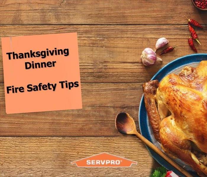 Cooked turkey and ingredients on a table with note "Thanksgiving Dinner Fire Safety Tips"